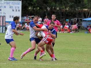 COMEBACK: Grafton Ghosts' Khan Williams and Matt Muller muscle up in defence against South Grafton Rebels' Ant Skinner. Picture: Greg Moss