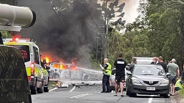 A witness to the crash uploaded this photo of one of the cars on fire.