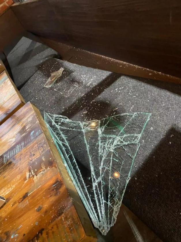 Smashed glass from a break-in on Wednesday night at One Little Tree cafe.