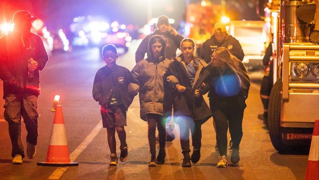 Children at the scene after the crash. Picture: Jake Nowakowski