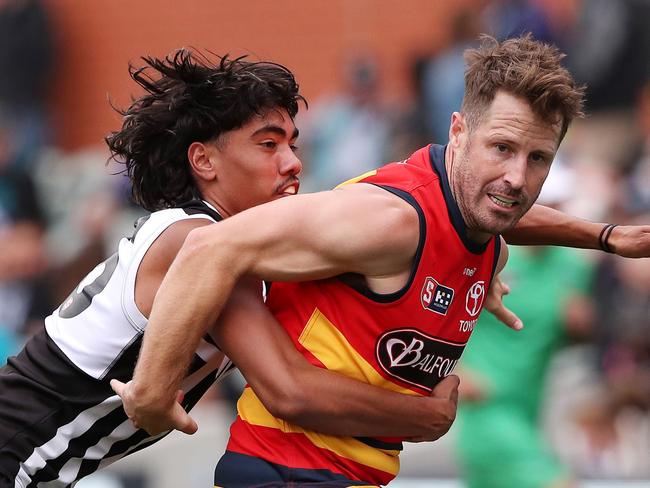 Saturday, 1st April, 2023 - SANFL Showdown. Port Adelaide v Adelaide Crows at the Adelaide Oval. Jase Burgoyne of Port Adelaide. And Matthew Wright of the Adelaide Crows. Picture: Sarah Reed
