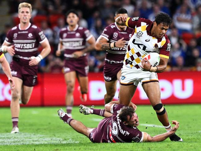 BRISBANE, AUSTRALIA - MAY 17: SelwynÃÂ Cobbo of the Broncos is tackled by KarlÃÂ Lawton of the Sea Eagles during the round 11 NRL match between Manly Sea Eagles and Brisbane Broncos at Suncorp Stadium, on May 17, 2024, in Brisbane, Australia. (Photo by Bradley Kanaris/Getty Images)