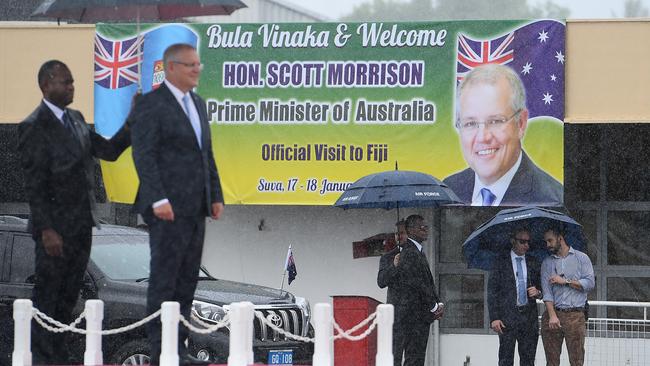 Scott Morrison receives a ceremonial greeting at Nausori Airport. Picture: AAP