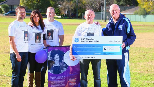 Siblings David, Deanne and Steve Cuff with dad Jeff and NSW Churches Football Association president  Paul Sydenham. Pictures: Phil Rogers