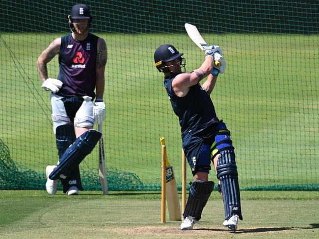 CAPE TOWN, SOUTH AFRICA - NOVEMBER 25: Jason Roy of England hits a shot as Ben Stokes looks on during an England Net Session at Newlands Stadium on November 25, 2020 in Cape Town, South Africa. (Photo by Shaun Botterill/Getty Images)