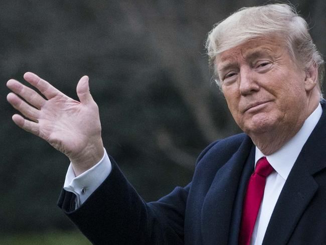 WASHINGTON, DC - JANUARY 31: U.S. President Donald Trump and First Lady Melania Trump walk along the South Lawn to Marine One as they depart from the White House for a weekend trip to Mar-a-Lago on January 31, 2020 in Washington, DC. Senators are expected to debate and then vote on whether to include additional witnesses and documents today in the Senate impeachment trial of President Trump. (Photo by Sarah Silbiger/Getty Images)