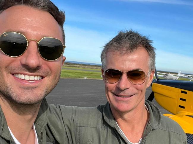 Mr Gale (right) taught comedian Tommy Little (left) to fly planes as a part of a television series. Photo: Facebook