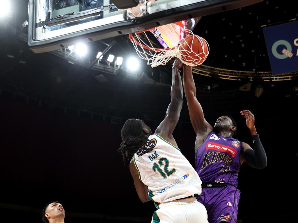 Kouat Noi dunks over Gorjok Gak of the JackJumpers during the round seven NBL match between Sydney Kings and Tasmania Jackjumpers at Qudos Bank Arena. Photo Brendon Thorne/Getty Images.