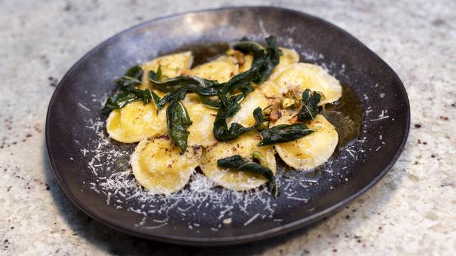 Ravioli, buffalo ricotta, buffalo mozzarella, parmigiano reggiano, burnt sage butter and pistachio