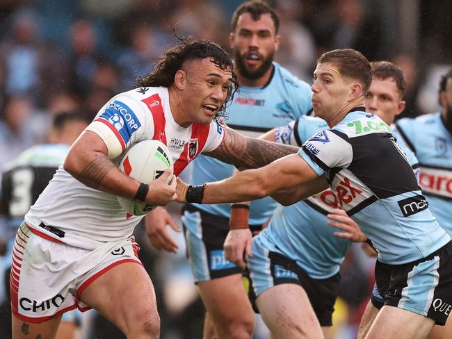 Jaydn Su'a looks to evade the Sharks defence. Picture: Matt King/Getty Images