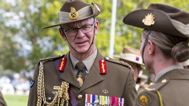 Chief of Army, Lieutenant General Rick Burr, AO, DSC, MVO (left), talks with soldiers during the Australian Army’s 119th birthday celebration at Russell Offices, Canberra. Supplied: ADF