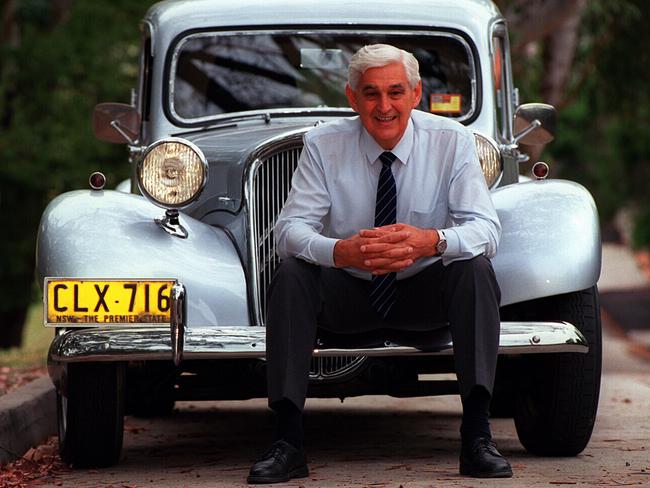 Mr Mack with his beloved 1951 Citroen which he used as his mayoral car. Picture: News Corp Archive