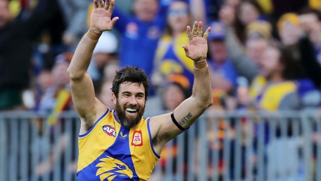 Josh Kennedy enjoys his eighth goal in his last AFL game. Picture: Will Russell/AFL Photos via Getty Images