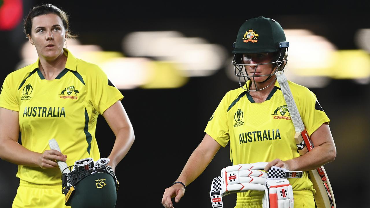 Tahlia McGrath (L) and Beth Mooney after defeating India in a triller. (Photo by Hannah Peters/Getty Images)