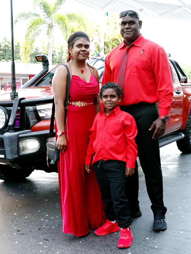 Lizikerah Sagigi, Nakorea Sagigi, 7, and Wiggy Sagigi arrive at the Mount St Bernard College senior formal evening, held at the Pullman Reef Hotel Casino. Picture: Brendan Radke