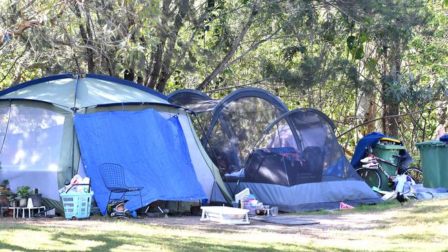 Perched on a glorified median strip beside the Gold Coast Highway is a homeless camp. Monday May 22, 2023. Picture: John Gass