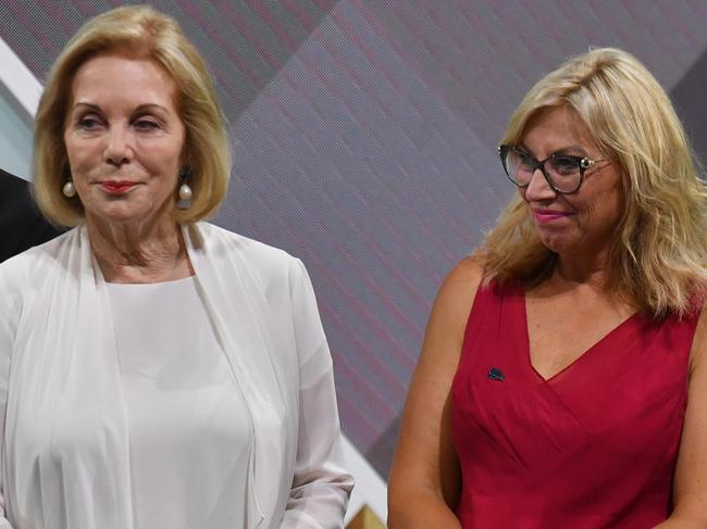 Former Australians of the Year Ita Buttrose and Rosie Batty up on stage during the 2020 Australian of the Year Awards at the National Arboretum in Canberra. Picture: AAP/Mick Tsikas