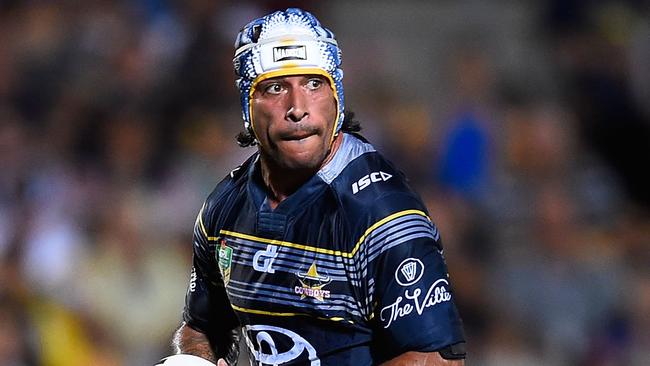 TOWNSVILLE, QUEENSLAND - APRIL 02: Johnathan Thurston of the Cowboys runs the ball during the round five NRL match between the North Queensland Cowboys and the St George Illawarra Dragons at 1300SMILES Stadium on April 2, 2016 in Townsville, Australia. (Photo by Ian Hitchcock/Getty Images)