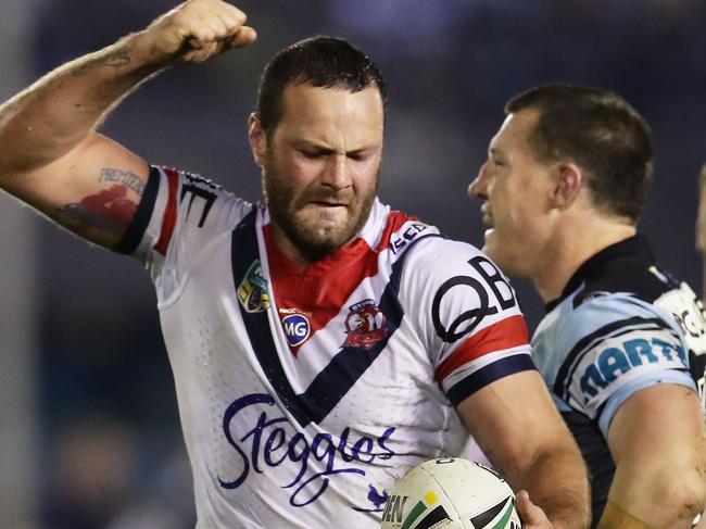 SYDNEY, AUSTRALIA - AUGUST 26:  Boyd Cordner of the Roosters celebrates as Paul Gallen of the Sharks is penalised in the final minutes leading to the winning penalty goal for the Roosters during the round 25 NRL match between the Cronulla Sharks and the Sydney Roosters at Southern Cross Group Stadium on August 26, 2017 in Sydney, Australia.  (Photo by Matt King/Getty Images)