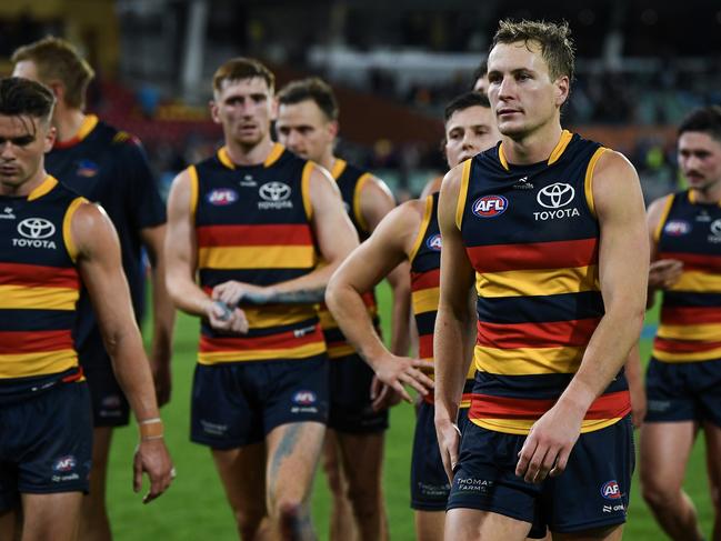 ADELAIDE, AUSTRALIA - JUNE 06:   Jordan Dawson of the Crows   leads his team off after losing the round 13 AFL match between Adelaide Crows and Richmond Tigers at Adelaide Oval, on June 06, 2024, in Adelaide, Australia. (Photo by Mark Brake/Getty Images)