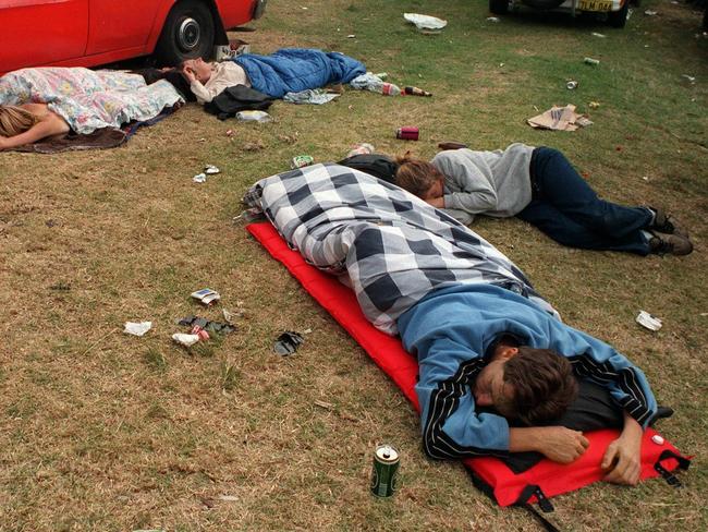 010199 In the 90s it wasn’t uncommon for revellers to sleep on Sorrento foreshore after ringing in a new year. These party goers were snapped the morning after on January 1, 1999. Picture: Andrew Batsch