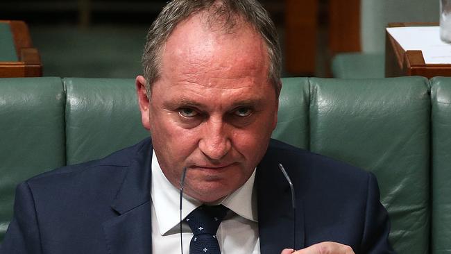 Barnaby Joyce showing the pressure he’s under while sitting in question time at Parliament House yesterday. Picture: Kym Smith