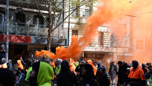 Protestors against mandatory vaccinations for construction workers walk through central Melbourne on Tuesday. Picture: NCA NewsWire / Andrew Henshaw