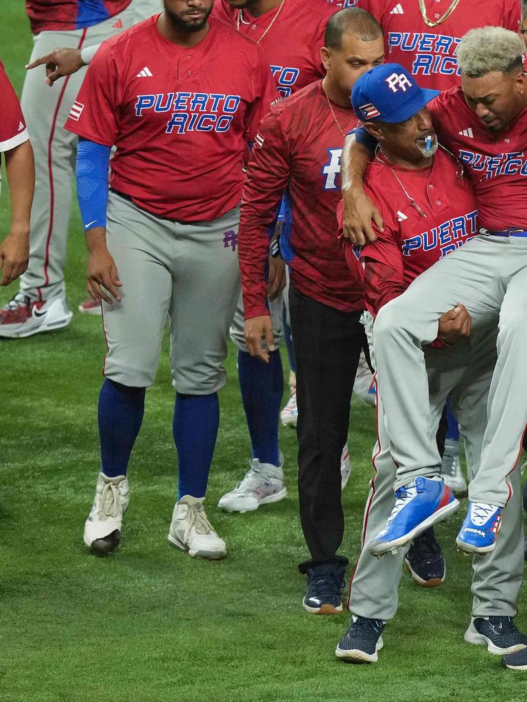 Puerto Rico players in tears after star pitcher Edwin Díaz injured  celebrating win, World Baseball Classic