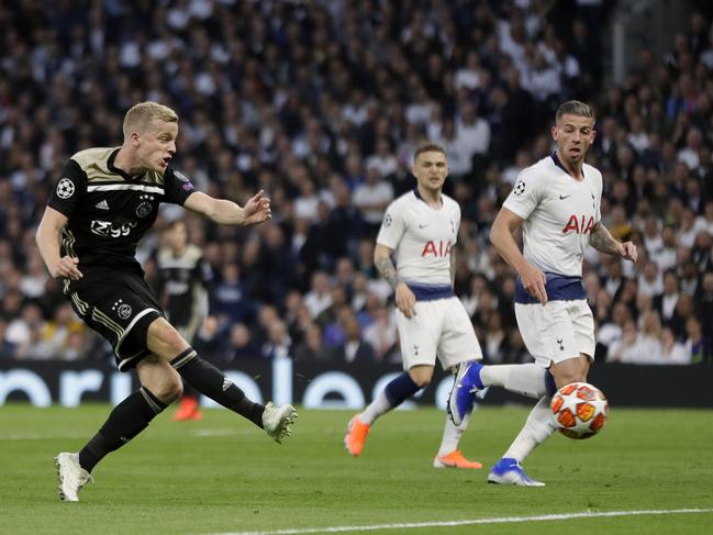 Ajax's Donny van de Beek scores his side's opening goal during the Champions League semifinal first leg soccer match between Tottenham Hotspur and Ajax at the Tottenham Hotspur stadium in London, Tuesday, April 30, 2019. (AP Photo/Kirsty Wigglesworth)