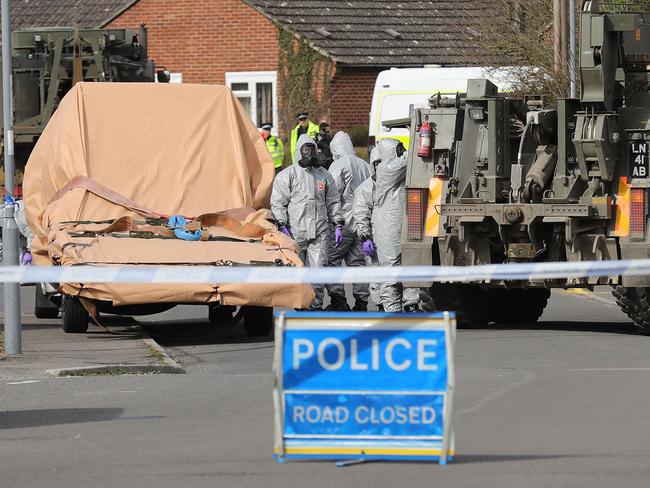 Forensic teams work at an address in Dorset as they remove a recovery truck used following the Salisbury nerve agent attack. Picture: Christopher Furlong/Getty Images