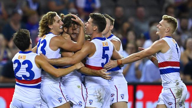 Josh Bruce was swamped after slotting his tenth goal. Picture: Getty Images