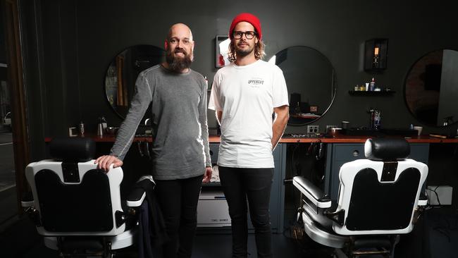 Brady Monks and Philip Curd barber at Monks &amp; Co in midtown Hobart. Picture: NIKKI DAVIS-JONES