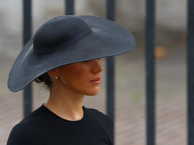 The Duchess of Sussex was largely hidden by her elegant hat. Picture: AFP