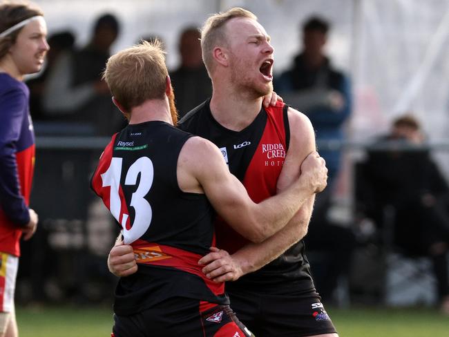 RDFL grand final: Riddell v Diggers Rest: Liam Berry of Riddell (R) celebrates a goal on Sunday September 11th, 2022, in Romsey, Victoria, Australia.Photo: Hamish Blair