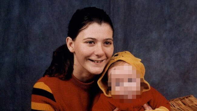 Amber Haigh, 19, with her infant child in 2002.