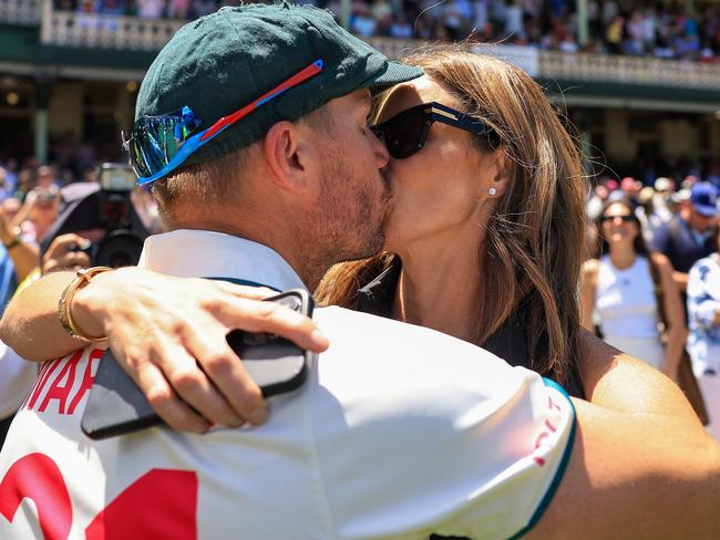 SYDNEY, AUSTRALIA - JANUARY 06: David Warner of Australia is kissed by wife Candice Warner after winning the series against Pakistan during day four of the Men's Third Test Match in the series between Australia and Pakistan at Sydney Cricket Ground on January 06, 2024 in Sydney, Australia. (Photo by Mark Evans/Getty Images) *** BESTPIX ***