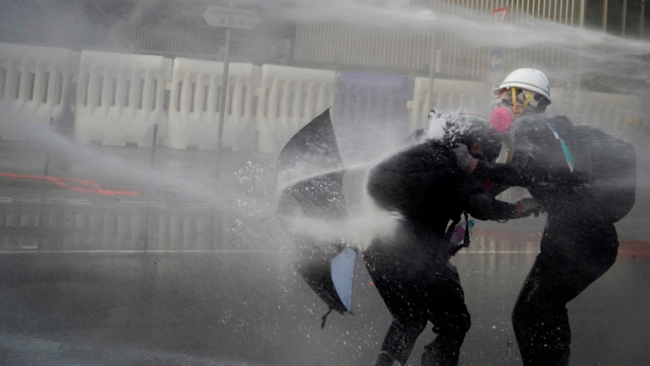 Hong Kong police fire tear gas, water canon at protestors | Herald Sun