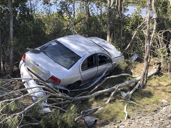 A car which left Yamba Road near Romiaka Channel and crashed into trees near the waterway has been left for three days.