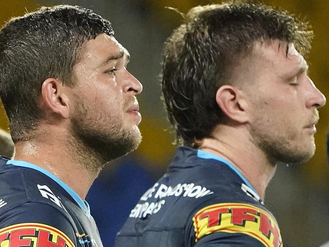 Titans player Ash Taylor (left) and Jai Arrow react following an Eels try during the Round 2 NRL match between the Gold Coast Titans and the Parramatta Eels at CBus Super Stadium on the Gold Coast, Sunday, March 22, 2020. (AAP Image/Dave Hunt) NO ARCHIVING, EDITORIAL USE ONLY