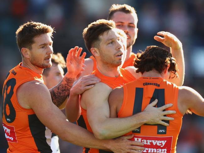 CANBERRA, AUSTRALIA - JULY 23: Toby Greene of the Giants celebrates a goal with team mates during the round 19 AFL match between Greater Western Sydney Giants and Gold Coast Suns at Manuka Oval, on July 23, 2023, in Canberra, Australia. (Photo by Mark Nolan/AFL Photos/via Getty Images )