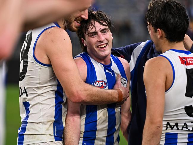 PERTH, AUSTRALIA - JUNE 08: George Wardlaw of the Kangaroos is happy with the win during the 2024 AFL Round 12 match between the West Coast Eagles and the North Melbourne Kangaroos at Optus Stadium on June 08, 2024 in Perth, Australia. (Photo by Daniel Carson/AFL Photos via Getty Images)