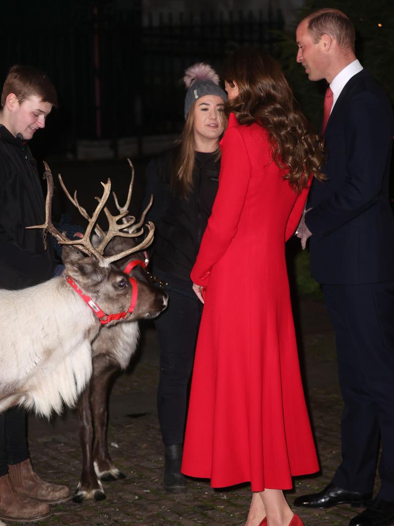 Prince William and Kate Middleton meet a reindeer at the Christmas event. Picture: Chris Jackson/Getty Images