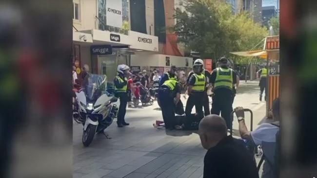 Man allegedly carrying Nazi symbol and knife arrested in Rundle Mall. Picture: 7NEWS