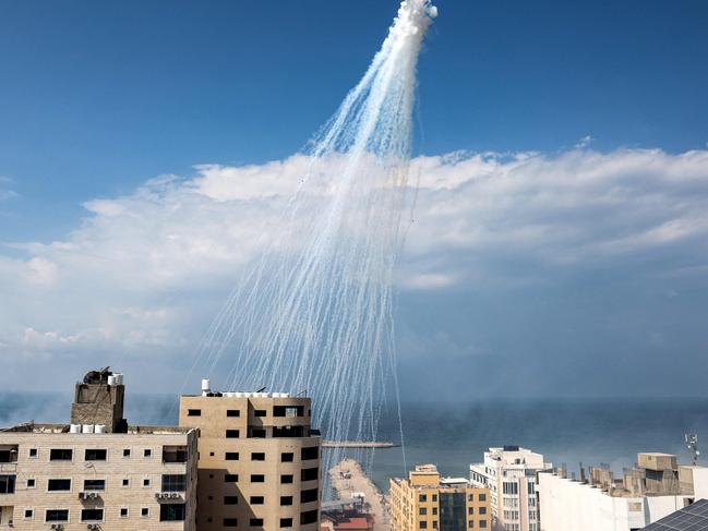 Smoke from Israeli incendiary munitions bombardment is pictured over the Gaza City seaport. Picture: AFP