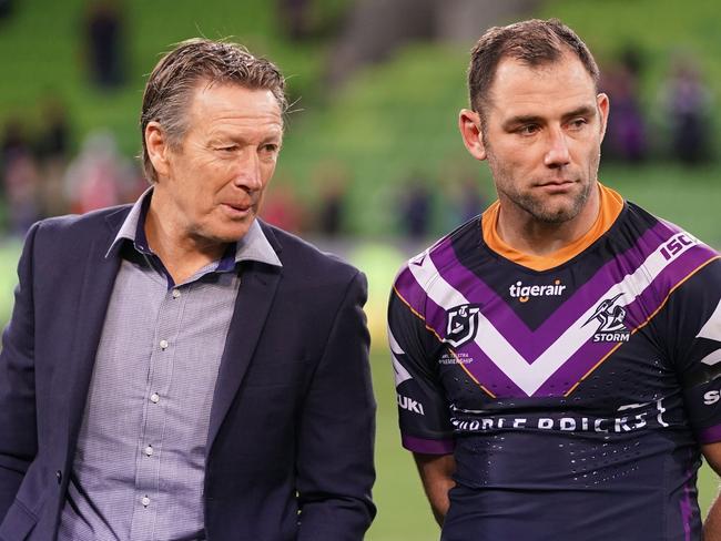 Craig Bellamy, coach of the Melbourne Storm and Cameron Smith talk during the Round 25 NRL match between the Melbourne Storm and the North Queensland Cowboys at AAMI Park in Melbourne, Friday, September 6, 2019. (AAP Image/Scott Barbour) NO ARCHIVING, EDITORIAL USE ONLY