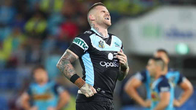 GOLD COAST, AUSTRALIA — APRIL 28: Josh Dugan of the Sharks leaves the field injured during the round eight NRL match between the Gold Coast Titans and Cronulla Sharks at Cbus Super Stadium on April 28, 2018 in Gold Coast, Australia. (Photo by Chris Hyde/Getty Images)