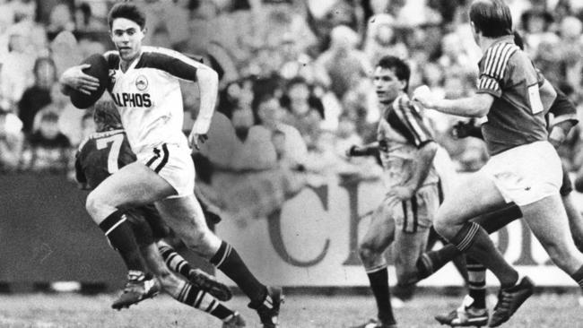 Penrith’s Brad Fittler runs with the ball in a 1989 match against Western Suburbs at Orana Park, Campbelltown.