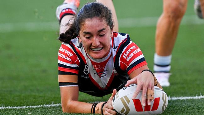 Sydney Roosters' Olivia Kernick scores a try during the National Rugby League (NRL) Women's Grand Final match between Sydney Roosters and Cronulla Sharks at Accor Stadium in Sydney on October 6, 2024. (Photo by Izhar KHAN / AFP) / -- IMAGE RESTRICTED TO EDITORIAL USE - STRICTLY NO COMMERCIAL USE --