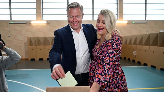 LNP candidate for the federal seat of Fadden, Cameron Caldwell and his wife Lauren vote at Coomera Rivers State School following the resignation of Stuart Robert. Picture: Dan Peled / NCA Newswire