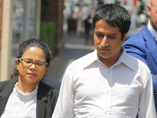 Prakash Paudyal (right) enters Manly court for sentencing. Picture John Grainger